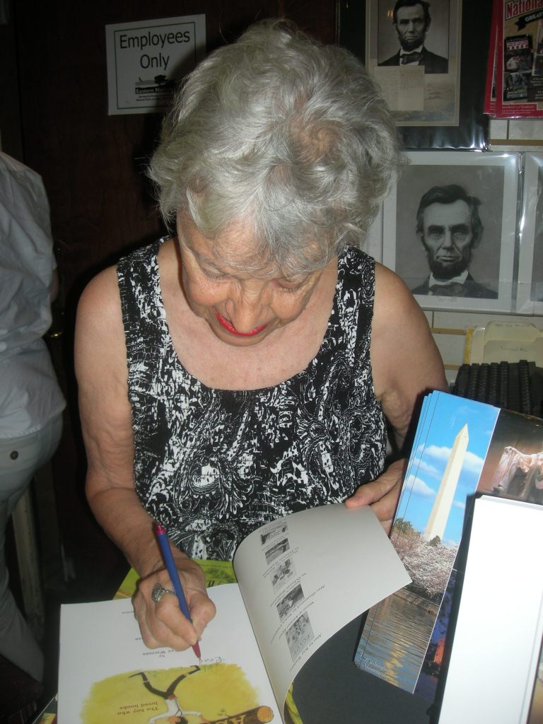 Kay signing at Lincoln Memorial