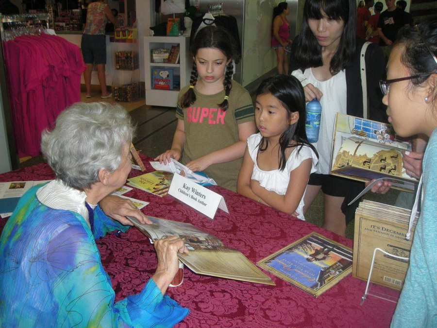 Kay signing at Smithsonian